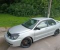 Сірий Міцубісі Lancer, об'ємом двигуна 2 л та пробігом 240 тис. км за 3500 $, фото 1 на Automoto.ua