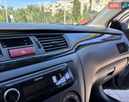 Серый Мицубиси Лансер, объемом двигателя 1.58 л и пробегом 167 тыс. км за 5100 $, фото 28 на Automoto.ua