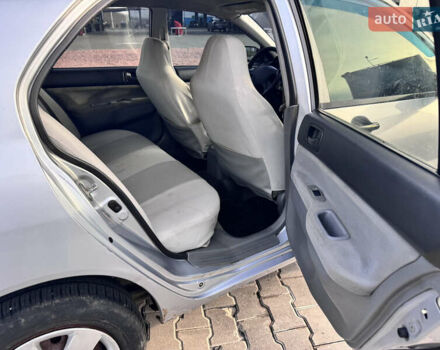 Серый Мицубиси Лансер, объемом двигателя 1.3 л и пробегом 450 тыс. км за 2999 $, фото 19 на Automoto.ua