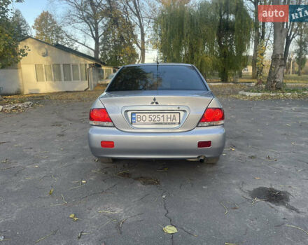 Сірий Міцубісі Lancer, об'ємом двигуна 1.58 л та пробігом 271 тис. км за 3000 $, фото 5 на Automoto.ua