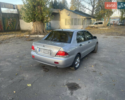 Сірий Міцубісі Lancer, об'ємом двигуна 1.58 л та пробігом 271 тис. км за 3000 $, фото 4 на Automoto.ua