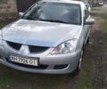 Сірий Міцубісі Lancer, об'ємом двигуна 1.6 л та пробігом 147 тис. км за 6100 $, фото 1 на Automoto.ua