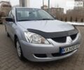 Сірий Міцубісі Lancer, об'ємом двигуна 1.3 л та пробігом 210 тис. км за 4400 $, фото 11 на Automoto.ua