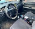 Сірий Міцубісі Lancer, об'ємом двигуна 1.58 л та пробігом 307 тис. км за 3800 $, фото 5 на Automoto.ua