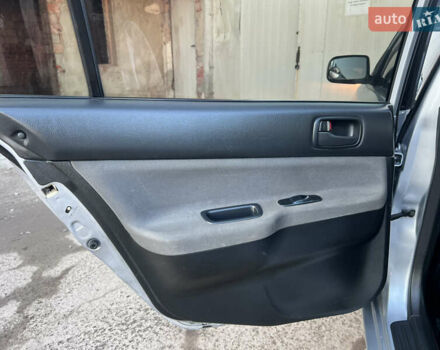 Серый Мицубиси Лансер, объемом двигателя 1.6 л и пробегом 320 тыс. км за 3650 $, фото 37 на Automoto.ua