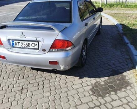 Сірий Міцубісі Lancer, об'ємом двигуна 1.58 л та пробігом 320 тис. км за 3700 $, фото 5 на Automoto.ua
