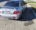 Сірий Міцубісі Lancer, об'ємом двигуна 1.58 л та пробігом 320 тис. км за 3700 $, фото 5 на Automoto.ua