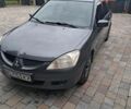 Сірий Міцубісі Lancer, об'ємом двигуна 1.58 л та пробігом 290 тис. км за 3900 $, фото 1 на Automoto.ua