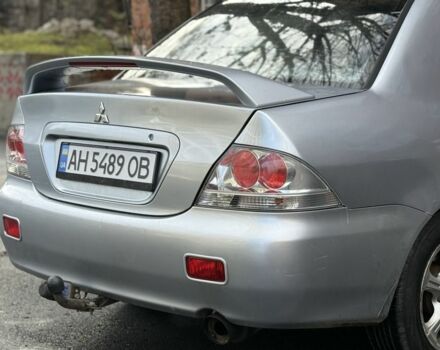 Серый Мицубиси Лансер, объемом двигателя 2 л и пробегом 180 тыс. км за 3700 $, фото 5 на Automoto.ua