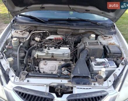 Серый Мицубиси Лансер, объемом двигателя 1.6 л и пробегом 244 тыс. км за 4000 $, фото 5 на Automoto.ua