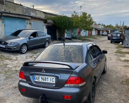 Сірий Міцубісі Lancer, об'ємом двигуна 1.58 л та пробігом 307 тис. км за 3800 $, фото 2 на Automoto.ua