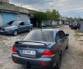 Сірий Міцубісі Lancer, об'ємом двигуна 1.58 л та пробігом 307 тис. км за 3800 $, фото 2 на Automoto.ua