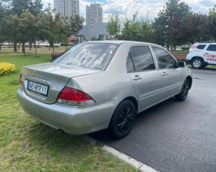 Сірий Міцубісі Lancer, об'ємом двигуна 1.3 л та пробігом 216 тис. км за 2999 $, фото 2 на Automoto.ua