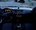 Серый Мицубиси Лансер, объемом двигателя 1.6 л и пробегом 200 тыс. км за 3300 $, фото 7 на Automoto.ua
