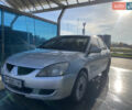 Сірий Міцубісі Lancer, об'ємом двигуна 1.3 л та пробігом 376 тис. км за 3700 $, фото 1 на Automoto.ua