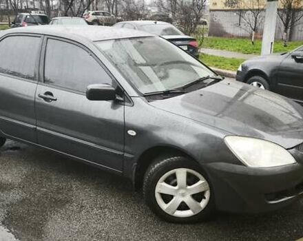 Сірий Міцубісі Lancer, об'ємом двигуна 1.58 л та пробігом 110 тис. км за 2999 $, фото 13 на Automoto.ua