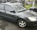 Сірий Міцубісі Lancer, об'ємом двигуна 1.58 л та пробігом 110 тис. км за 2999 $, фото 13 на Automoto.ua