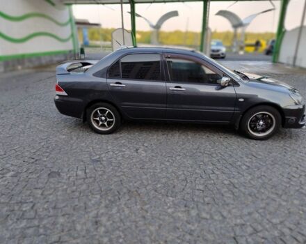 Сірий Міцубісі Lancer, об'ємом двигуна 1.6 л та пробігом 177 тис. км за 4500 $, фото 18 на Automoto.ua