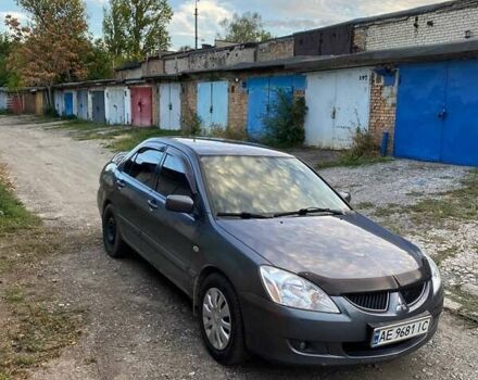 Сірий Міцубісі Lancer, об'ємом двигуна 1.58 л та пробігом 307 тис. км за 3800 $, фото 1 на Automoto.ua