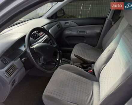 Серый Мицубиси Лансер, объемом двигателя 1.29 л и пробегом 263 тыс. км за 3400 $, фото 6 на Automoto.ua