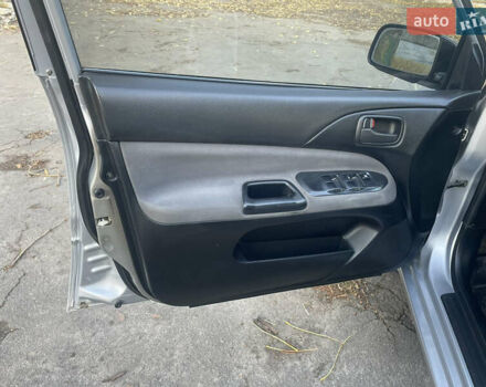 Сірий Міцубісі Lancer, об'ємом двигуна 1.58 л та пробігом 271 тис. км за 3000 $, фото 18 на Automoto.ua