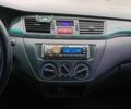 Сірий Міцубісі Lancer, об'ємом двигуна 1.6 л та пробігом 284 тис. км за 4280 $, фото 15 на Automoto.ua