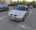 Сірий Міцубісі Lancer, об'ємом двигуна 1.6 л та пробігом 239 тис. км за 2508 $, фото 1 на Automoto.ua