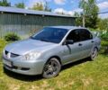 Сірий Міцубісі Lancer, об'ємом двигуна 1.6 л та пробігом 272 тис. км за 3103 $, фото 1 на Automoto.ua