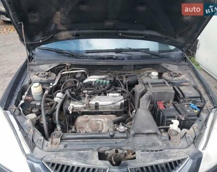 Сірий Міцубісі Lancer, об'ємом двигуна 1.58 л та пробігом 531 тис. км за 2828 $, фото 13 на Automoto.ua
