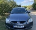 Сірий Міцубісі Lancer, об'ємом двигуна 1.6 л та пробігом 320 тис. км за 3602 $, фото 1 на Automoto.ua