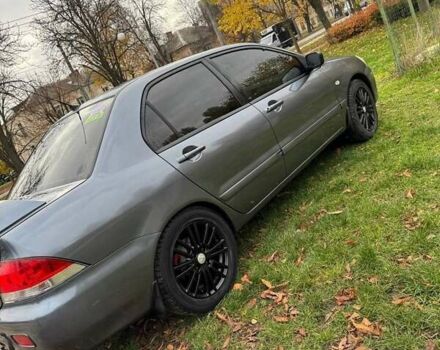 Серый Мицубиси Лансер, объемом двигателя 1.58 л и пробегом 313 тыс. км за 4650 $, фото 8 на Automoto.ua