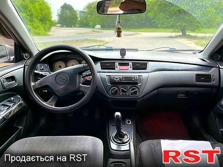 Серый Мицубиси Лансер, объемом двигателя 1.6 л и пробегом 260 тыс. км за 2900 $, фото 6 на Automoto.ua