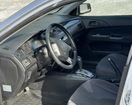 Сірий Міцубісі Lancer, об'ємом двигуна 1.6 л та пробігом 260 тис. км за 3899 $, фото 7 на Automoto.ua