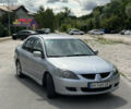 Сірий Міцубісі Lancer, об'ємом двигуна 2 л та пробігом 200 тис. км за 3550 $, фото 5 на Automoto.ua