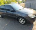 Сірий Міцубісі Lancer, об'ємом двигуна 1.6 л та пробігом 303 тис. км за 3800 $, фото 5 на Automoto.ua