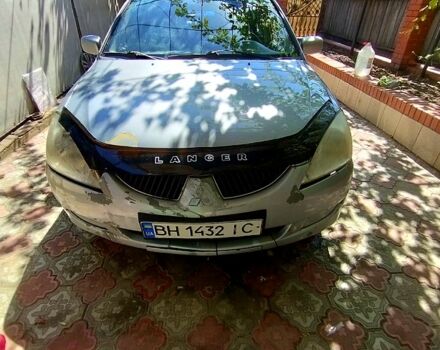 Серый Мицубиси Лансер, объемом двигателя 1.6 л и пробегом 308 тыс. км за 3500 $, фото 8 на Automoto.ua