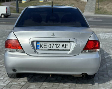 Сірий Міцубісі Lancer, об'ємом двигуна 1.6 л та пробігом 260 тис. км за 3899 $, фото 3 на Automoto.ua