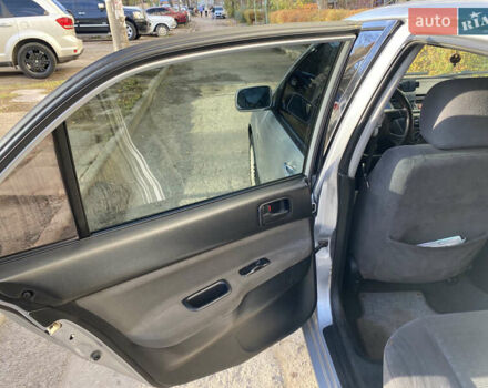 Сірий Міцубісі Lancer, об'ємом двигуна 1.3 л та пробігом 376 тис. км за 3700 $, фото 11 на Automoto.ua