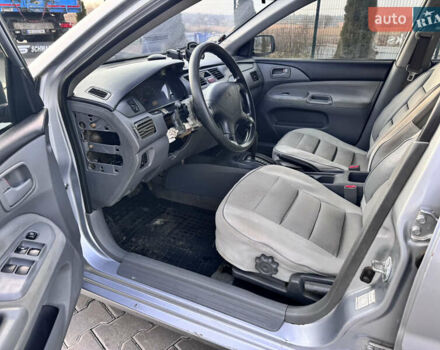 Сірий Міцубісі Lancer, об'ємом двигуна 1.3 л та пробігом 450 тис. км за 2650 $, фото 10 на Automoto.ua
