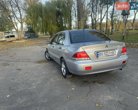 Сірий Міцубісі Lancer, об'ємом двигуна 1.58 л та пробігом 271 тис. км за 3000 $, фото 6 на Automoto.ua