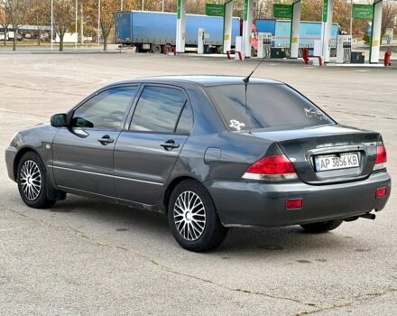 Серый Мицубиси Лансер, объемом двигателя 1.6 л и пробегом 490 тыс. км за 1799 $, фото 7 на Automoto.ua