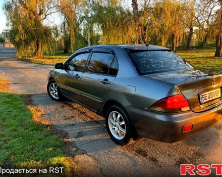 Серый Мицубиси Лансер, объемом двигателя 1.6 л и пробегом 275 тыс. км за 3000 $, фото 7 на Automoto.ua