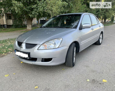 Сірий Міцубісі Lancer, об'ємом двигуна 1.6 л та пробігом 300 тис. км за 4599 $, фото 3 на Automoto.ua