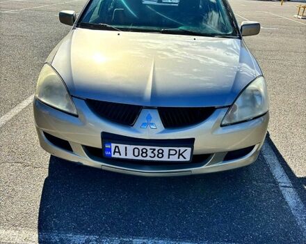 Серый Мицубиси Лансер, объемом двигателя 1.3 л и пробегом 245 тыс. км за 3000 $, фото 12 на Automoto.ua