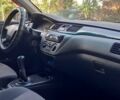 Серый Мицубиси Лансер, объемом двигателя 1.6 л и пробегом 353 тыс. км за 2999 $, фото 5 на Automoto.ua