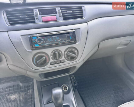 Сірий Міцубісі Lancer, об'ємом двигуна 1.3 л та пробігом 450 тис. км за 2650 $, фото 12 на Automoto.ua
