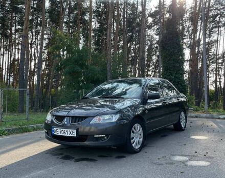 Серый Мицубиси Лансер, объемом двигателя 1.6 л и пробегом 320 тыс. км за 5000 $, фото 5 на Automoto.ua