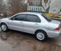 Серый Мицубиси Лансер, объемом двигателя 1.6 л и пробегом 290 тыс. км за 4000 $, фото 6 на Automoto.ua