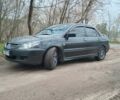 Сірий Міцубісі Lancer, об'ємом двигуна 1.58 л та пробігом 360 тис. км за 4000 $, фото 9 на Automoto.ua