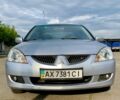 Сірий Міцубісі Lancer, об'ємом двигуна 1.6 л та пробігом 285 тис. км за 4450 $, фото 3 на Automoto.ua